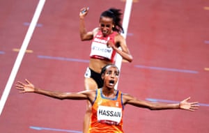 Sifan Hassan of the Netherlands celebrates after winning gold .