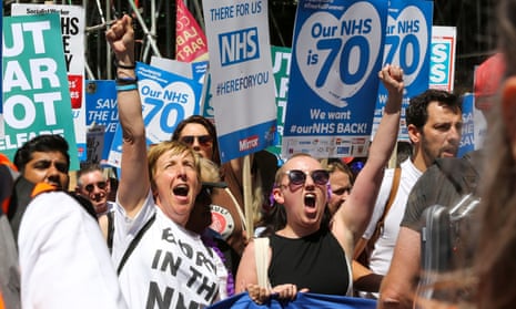 Actor Julie Hesmondhalgh (L) joins thousands of doctors, nurses, campaigners, unions and NHS supporters at the London rally.