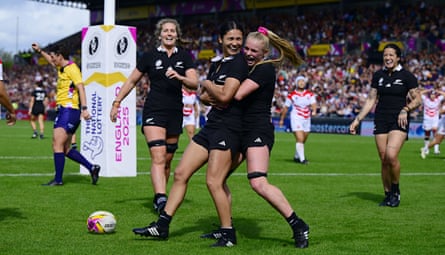 New Zealand’s Braxton Sorensen-McGee is congratulated by Jorja Miller after going over for a try during their Women’s Rugby World Cup 2025 group game against Japan.