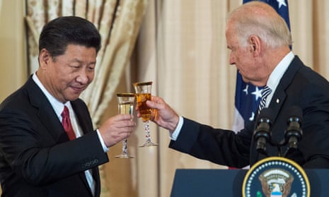 Chinese President Xi Jinping toasts the then US vice president Joe Biden in 2015. 