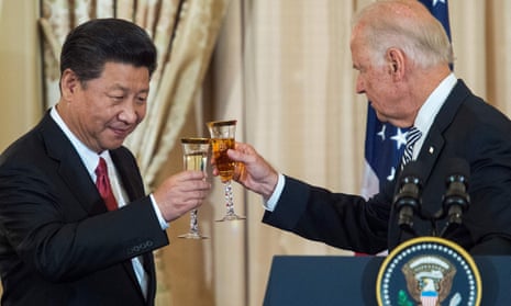In this photo taken on 25 September 2015, then-US vice-resident Joe Biden and Chinese president Xi Jinping toast during a state luncheon for China hosted by US secretary of state John Kerry in Washington DC.