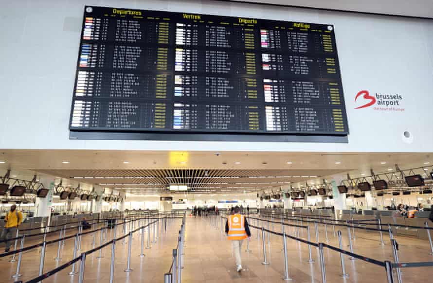 A flight information board shows cancelled flights at the Brussels airport as passenger planes will not take off due to a security guards strike.