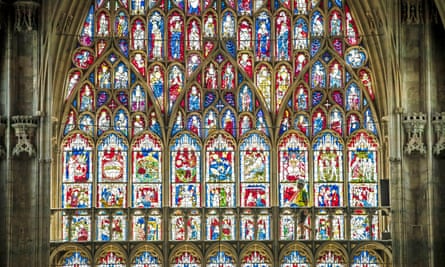 A recent Eyewitness photo: a workman in front of the newly restored Great East Window in York Minster.