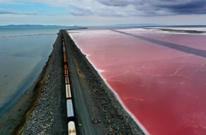 A railroad causeway divides the Great Salt Lake near Corinne, Utah