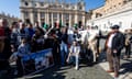 A delegation of farmers pose for a group photo with their cow during Pope Francis' Sunday Angelus in St Peter's Square at the Vatican