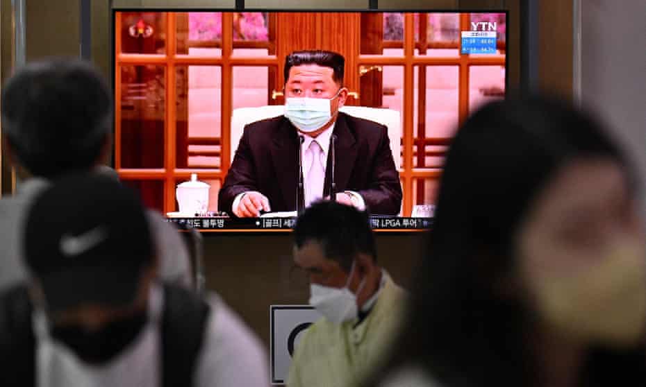 North Korea’s leader Kim Jong-un appearing in a face mask on television for the first time to order nationwide lockdowns.