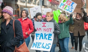Activists rally in New York on on 26 February 2017 over President Trump’s branding news that disagrees with him ‘fake news’.