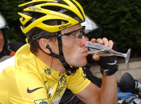 Tour de France legend Lance Armstrong sipping the hopefully flat champagne on the Champs-Élysees in 2003.