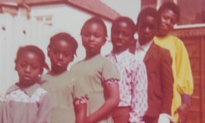 A Johnson family photograph shows Trevor and Desmond fourth and fifth from the left. They were 10 and 11 when they arrived in Britain.