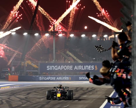 Max Verstappen driving his Red Bull car on a race track