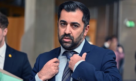 Scotland's first minister Humza Yousaf in the lobby of the Scottish parliament on 29 February 2024.