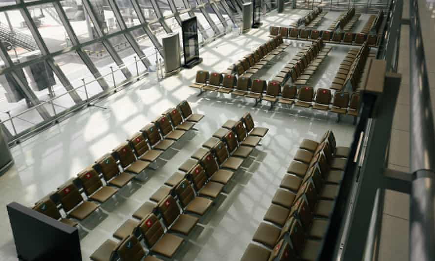 Thailand - May 29, 2020: An empty gate seats in departure terminal following the coronavirus outbreak, at Suvarnabhumi Airport in Bangkok