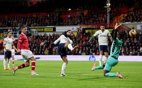 Douglas Luiz of Nottingham Forest hooks the ball home but his goal is disallowed by referee Paul Tierney due to handball.