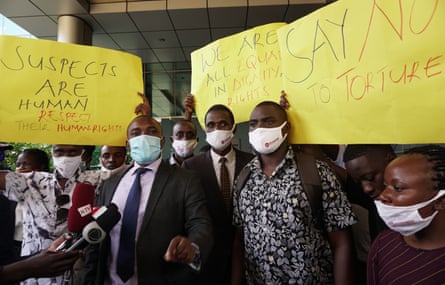 Adrian Jjuuko, (speaking, centre left) executive director of the Human Rights Awareness and Promotion Forum, has condemned the OHCHR closure.