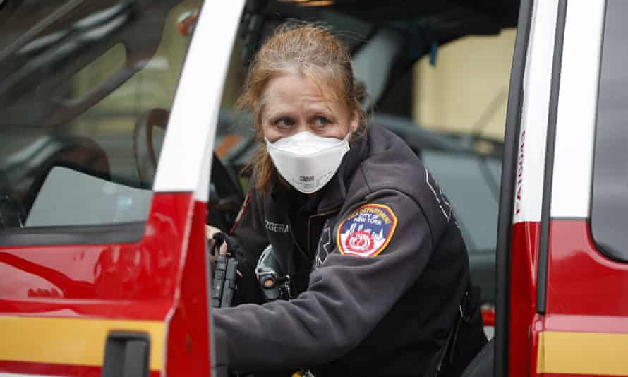 A Fire Department of New York (FDNY) medical worker wears personal protective equipment outside a COVID-19 testing site at Elmhurst Hospital Center, in the New York city borough of Queens yesterday. State governor Andrew Cuomo is warning things will get worse before they get better.