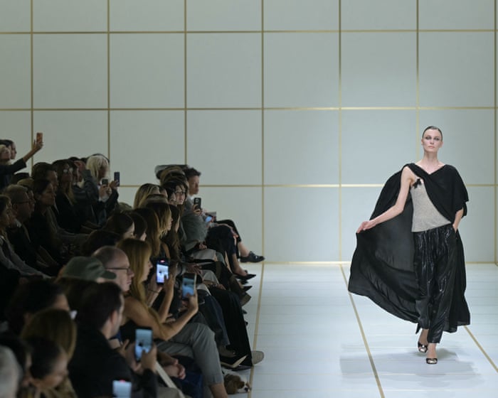 With turbulence all around, Armani plays it safe and easy in Milan