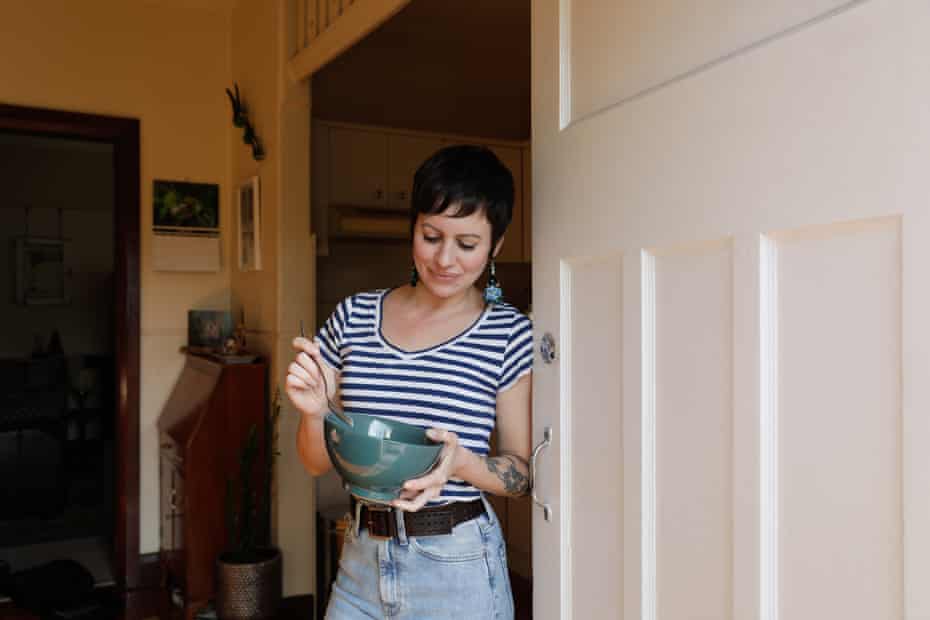 Jane Newton eating the rice bowl with vegetables and tofu that she has had for lunch every day for years.