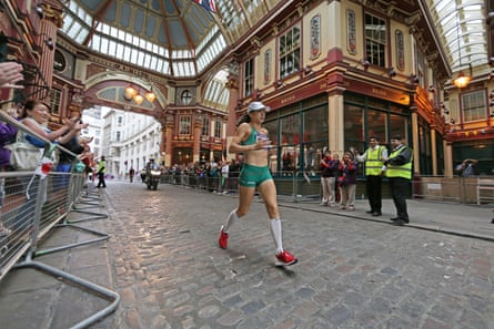 Caitriona Jennings passes through Leadenhall Market in the City of London during the Women’s Marathon at the London Olympics
