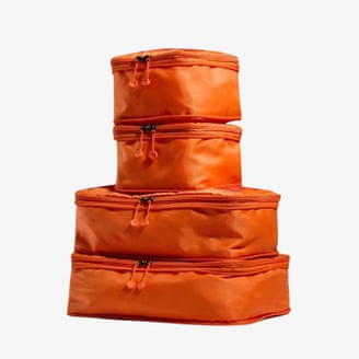 Antler Stripe packing cubes in coral.