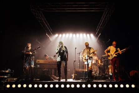 The band performing on stage.