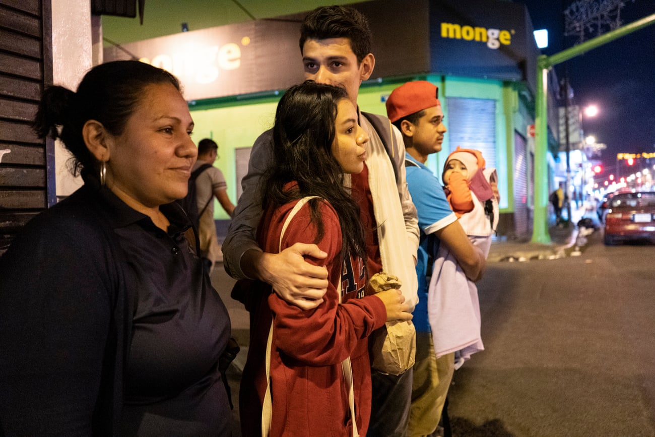 María Alejandra Castillo, 20, with her mother, boyfriend and other family members in downtown San José