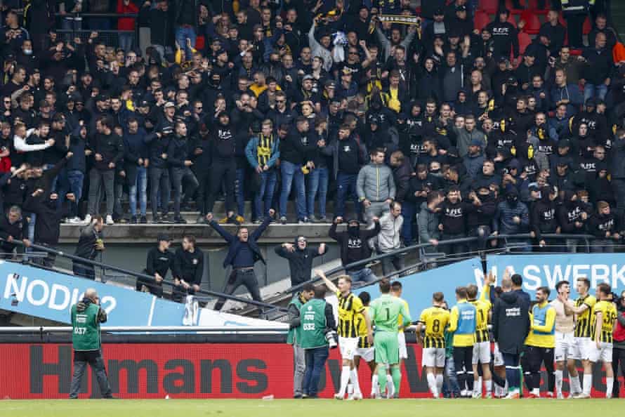 Vitesse salute their fans on the collapsed stand.