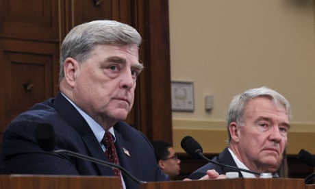 Two white men wearing suits and ties
