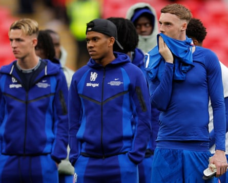 Cole Palmer (right) and his Chelsea teammates look dejected after losing the FA Cup final