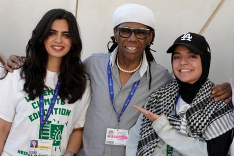 Nile Rodgers with young climate activists at the Cop28 Blue Zone