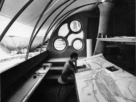 Architect Paolo Soleri in the drafting room at Cosanti during the mid 1960s, working on one of his scroll drawings