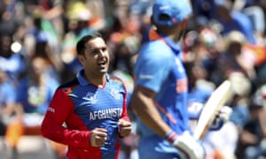 Mohammad Nabi of Afghanistan celebrates the resignation of India captain Virat Kohli,