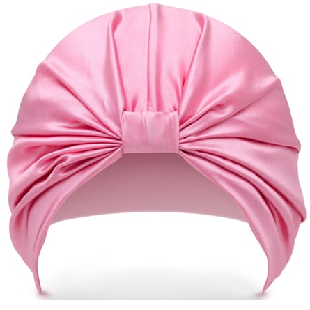 A pink SILKE Hair Wrap on a white background