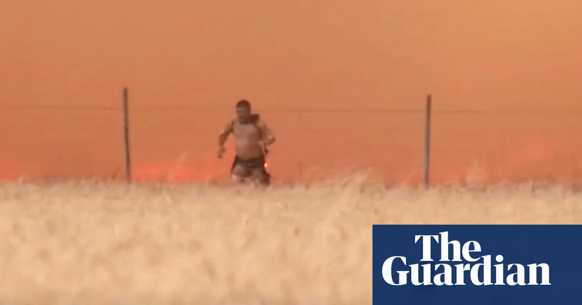 Spanish man filmed escaping wildfire treated for serious burns
