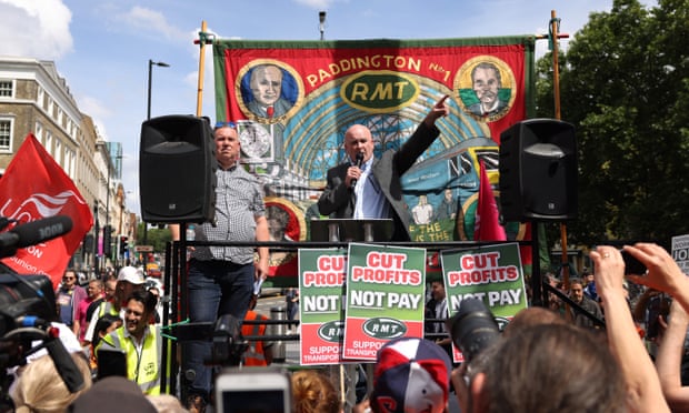 Mick Lynch speaks during an RMT strike rally outside Kings Cross station;