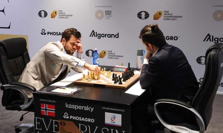 magnus carlsen embraces chaos in gripping draw with ian nepomniachtchi world chess championship 2021 the guardian