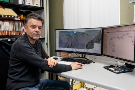 Environmental engineer Clément Daniel analysing algae build-up on Saint-Michel-En-Grève beach.