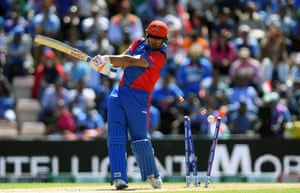 Hazratullah Zazai of Afghanistan is bowled by Mohammed Shami of India.
