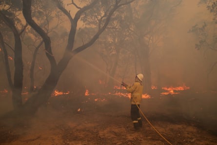 Firefighting crew fight a blaze near Braidwood, NSW.