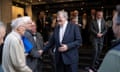 Garrick Club member Stephen Fry shakes hands with a well-wisher after the vote to allow women to join.