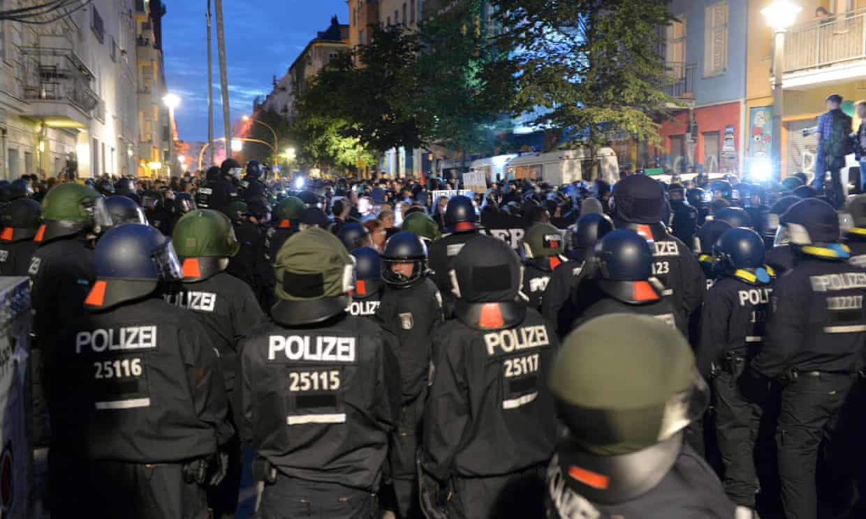 Police clash with demonstrators in Berlin.