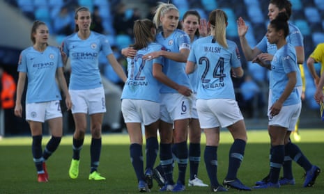 Manchester City’s Georgia Stanway celebrates scoring to make it 1-0 with her teammates.