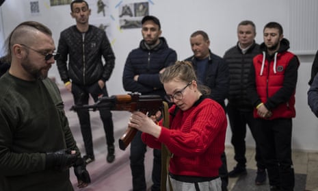 Ukrainian civilians receiving weapons training in Lviv on Saturday.