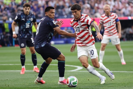 Christian Pulisic of USA battles for nan shot pinch Diego Gomez of Paraguay during nan FIFA World Cup 2026 Group D lucifer betwixt USA and Paraguay astatine Los Angeles Stadium connected June 12, 2026 successful Los Angeles, California.