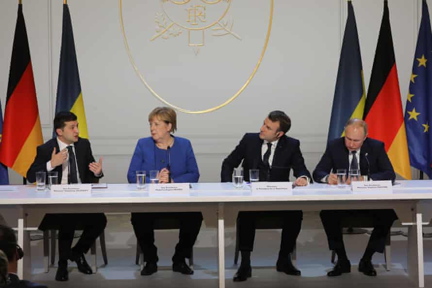 (FromL) Ukrainian President Volodymyr Zelensky, German Chancellor Angela Merkel, French President Emmanuel Macron and Russian President Vladimir Putin give a press conference after a summit on Ukraine at the Elysee Palace, in Paris, on December 9, 2019