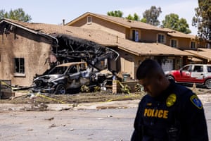 A damaged house in the aftermath of an aircraft crash