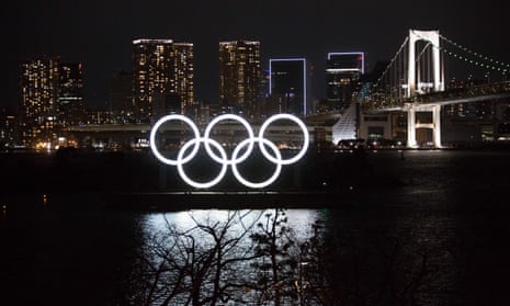The illuminated Olympic Rings installation at Odaiba Marine Park in Tokyo.