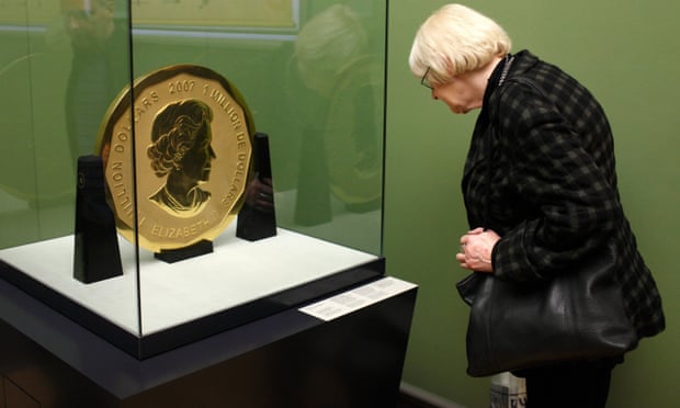 A visitor looks at the 100kg ‘Big Maple Leaf’ coin in the Bode museum.