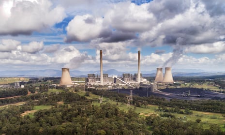 Bayswater power plant in Australian Upper Hunter Valley generating electricity from fossil fuel black coal emitting carbon dioxide into atmosphere on a sunny day.