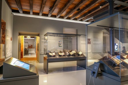 Display cases and old books in a museum