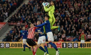 Manchester United’s Sergio Romero claims a cross.